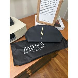 Carolina Herrera Black and Gold Toiletry Bag with Lightning Bolt